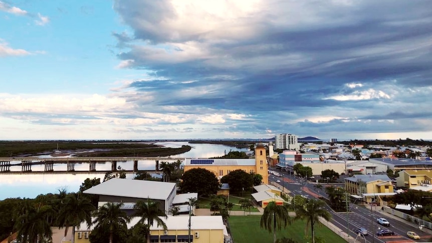 an aerial view of buildings in mackay and the pioneer river