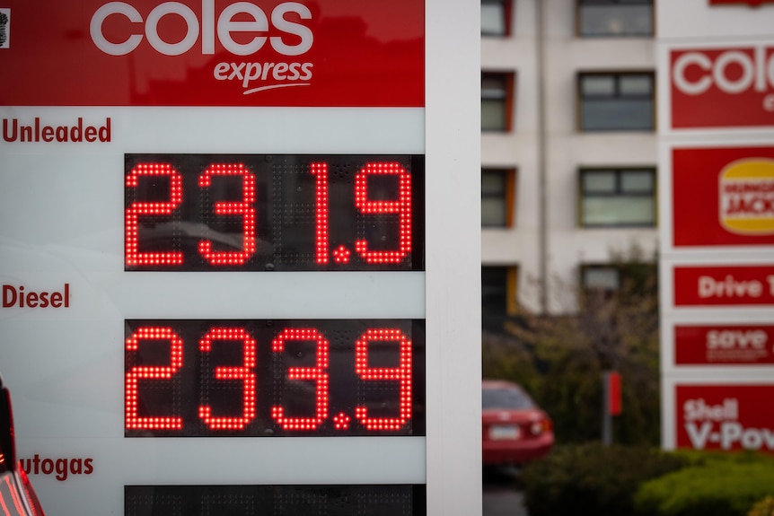 A close-up of a board displaying petrol prices for unleaded and diesel at a Shell store in Hobart. Tasmania