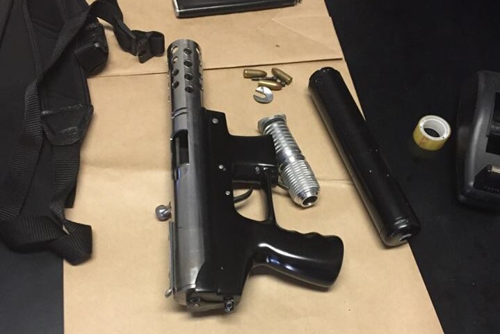 During the raid, police found a pistol, ammunition, steroids, cocaine and cash.