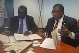 Bougainville electoral commissioner George Manu and PNG electoral commissioner Patilias Gamato.