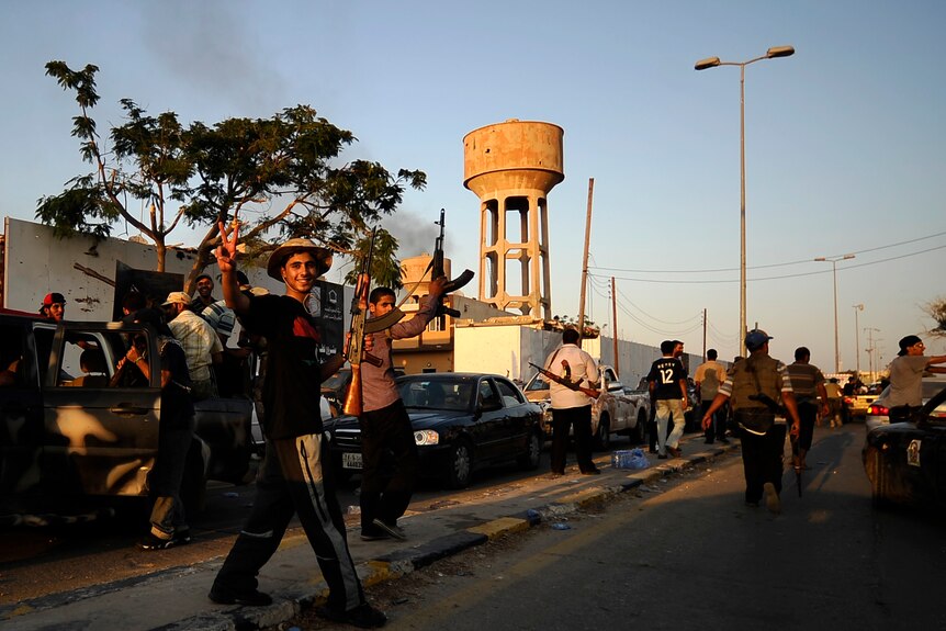 Rebels take over Gaddafi compound
