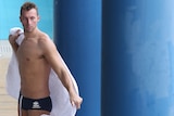 Cautious approach ... Ian Thorpe towels off after training in Singapore