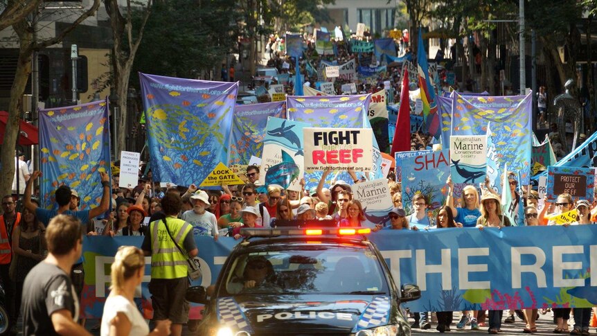 More than 1000 people march through Brisbane during the Rally for the Reef protest.