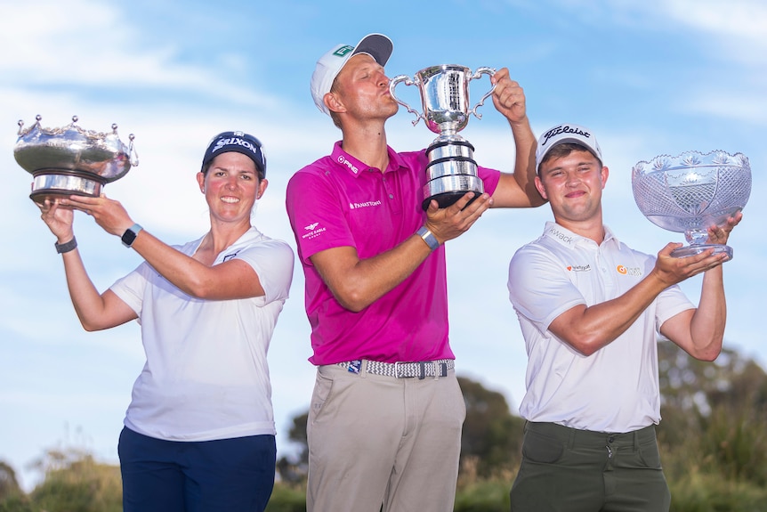 Ashleigh Buhai (left), Adrian Meronk and and Kipp Popert hold their Australian Open trophies.