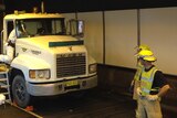 A truck has collided with the sprinkler system inside Sydney's Eastern Distributor tunnel