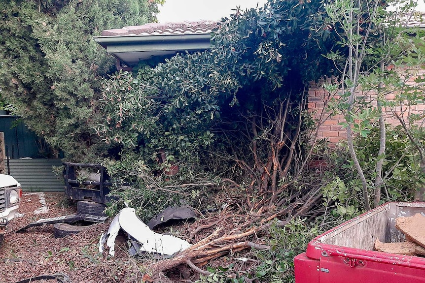 Damage to house where car crashed into it