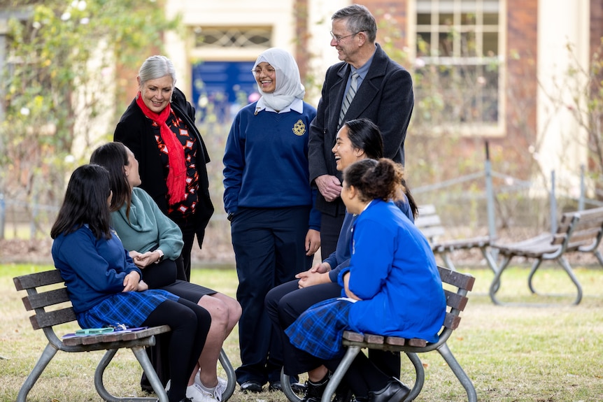 A group of students and two teachers.