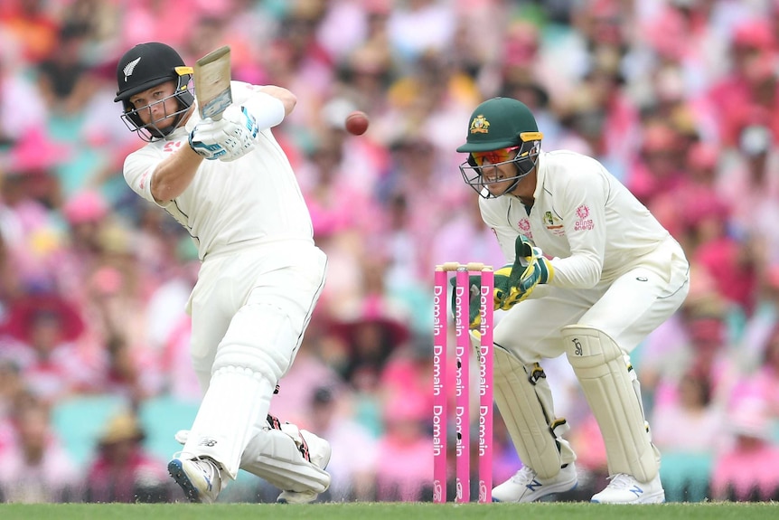 A NZ batsman grimaces as he plays a bouncing ball away on the leg side for a four.