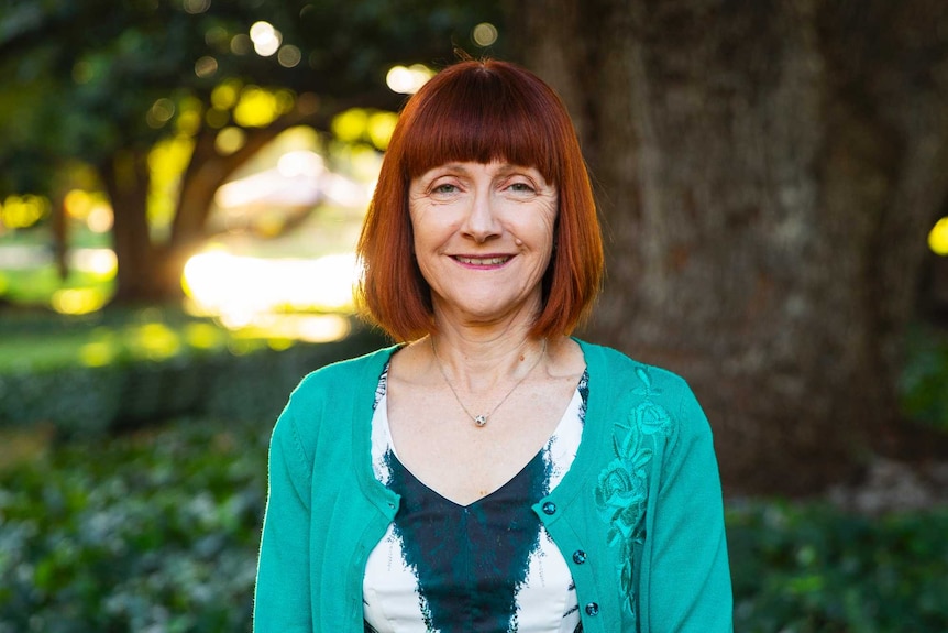 WA Green Senator Rachel Siewert stands in front of tree