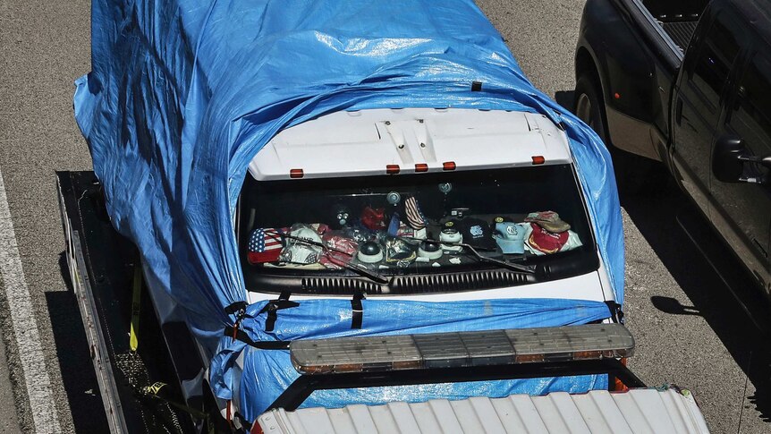 American paraphernalia on the dashboard of Cesar Sayoc's van.