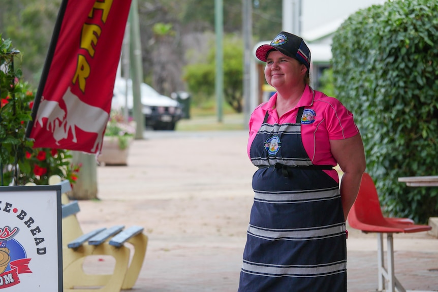 Taroom businesswoman and butchershop owner Andrea Beard on the footpath in the Taroom, Queensland November 2021.