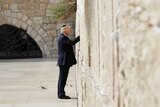 US President Donald Trump touches the Western Wall, Judaism's holiest prayer site.