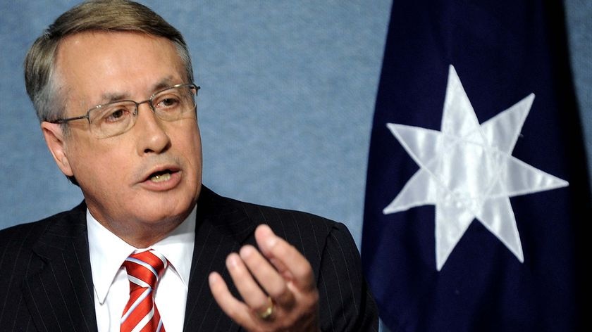 Federal Treasurer Wayne Swan speaks during a press conference