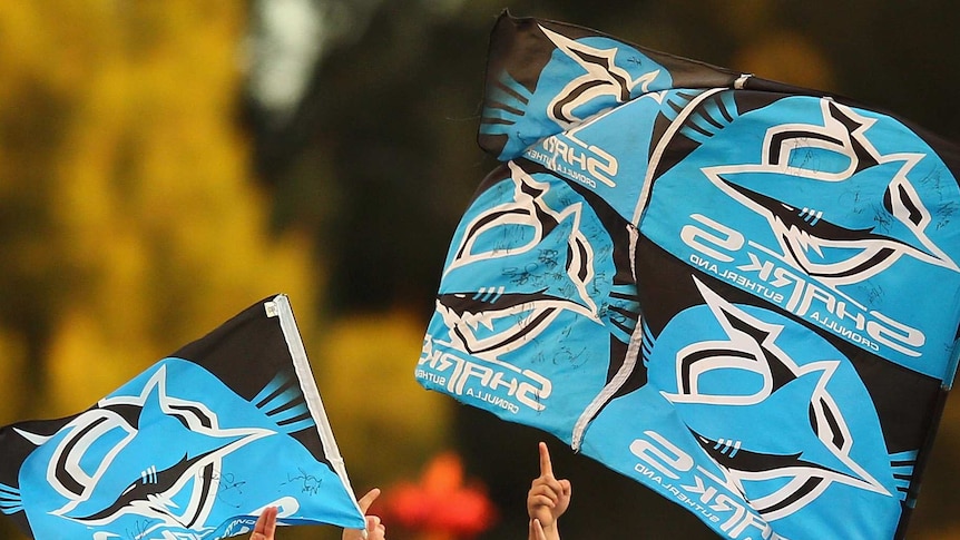 Cronulla fans wave flags