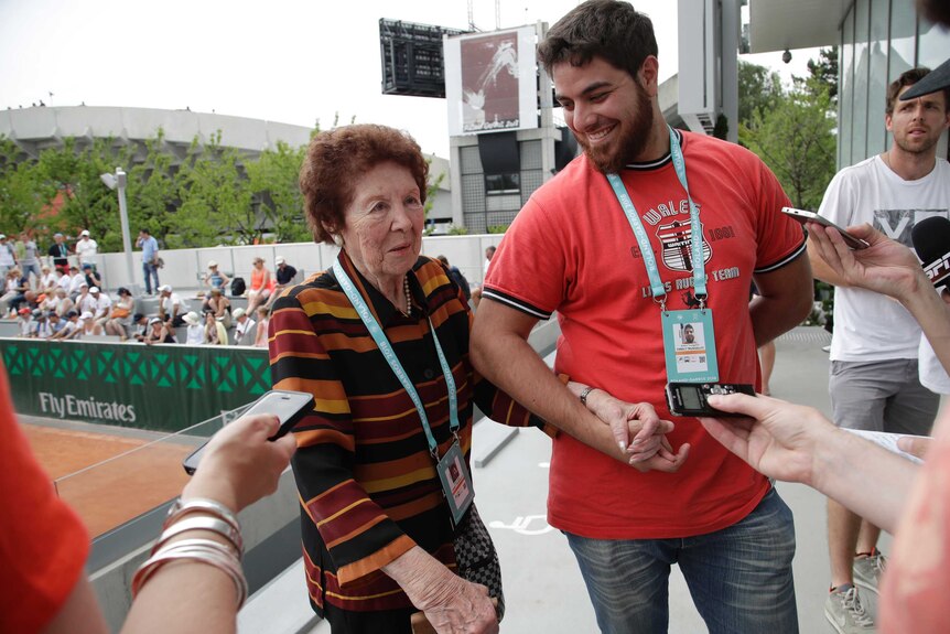 Argentina's Marco Trungelliti's grandmother Dafne Botta and brother Andre speak at the French Open.