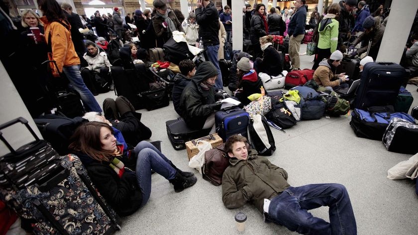 Stranded passengers wait at London St Pancras Eurostar terminal