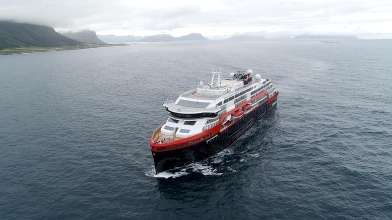 A photo of the Ms Roald Amundsen in the sea in Norway.