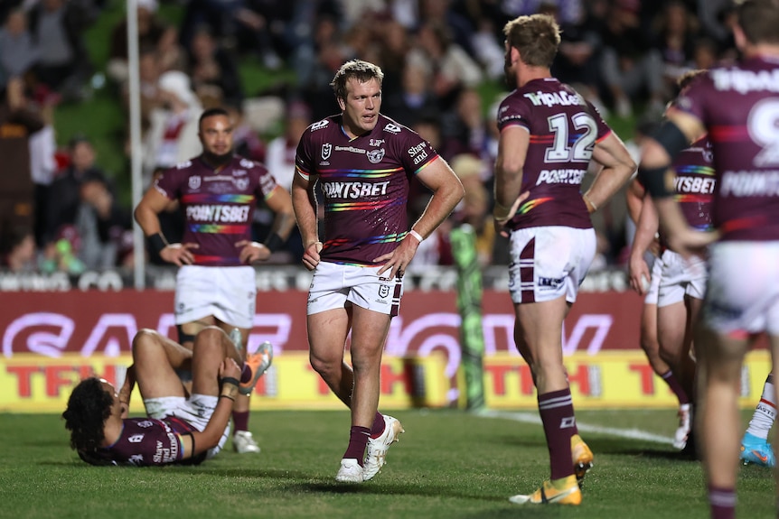 A man looks exasperated after Manly conceded a try