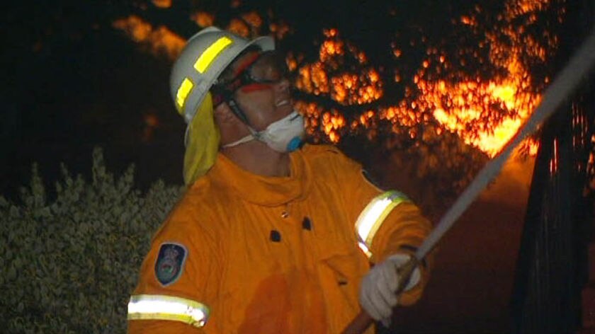 Firefighters battled throughout Wednesday night to protect homes at Brooms Head.