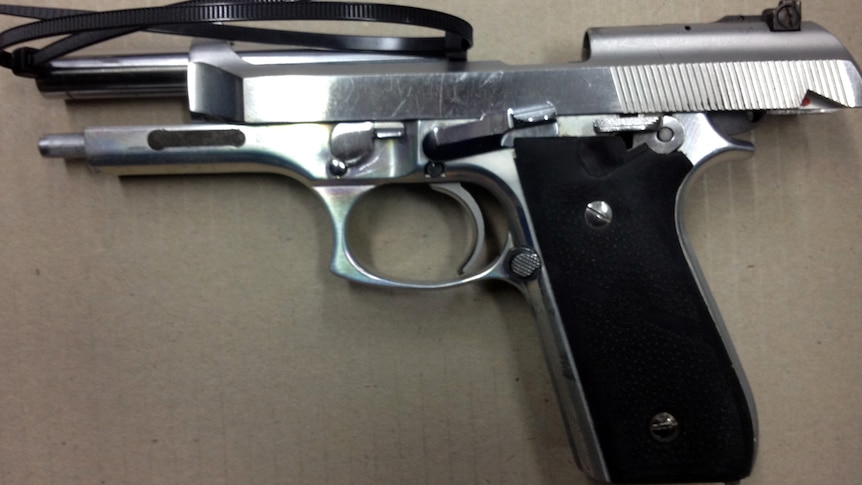 Pistol seized from Sydney smash repair shop