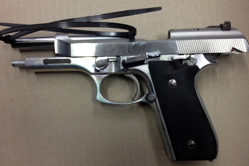 Pistol seized from Sydney smash repair shop