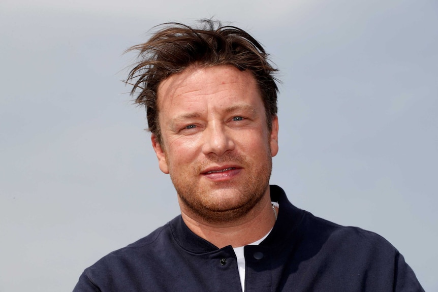Jamie Oliver poses during a photocall in France.