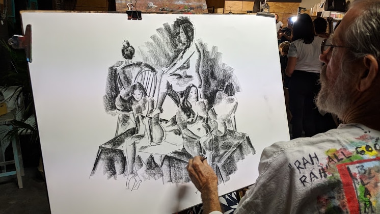 The women have been drawn in various nude poses by an artist with a grey beard