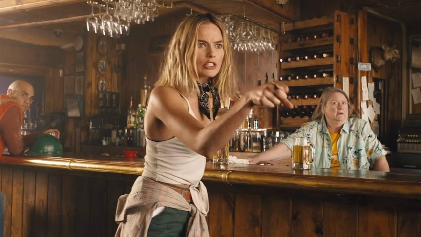 Margot Robbie in Tourism Australia ad taking off Croc Dundee
