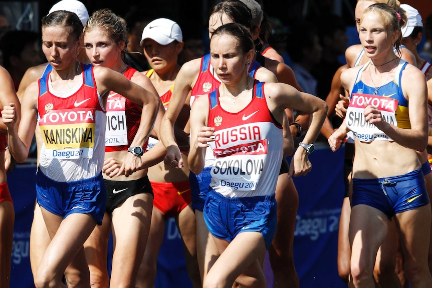 Russia's Olga Kaniskina, left, Russia's Vera Sokolova, center, and Ukraine's Olena Shumkina