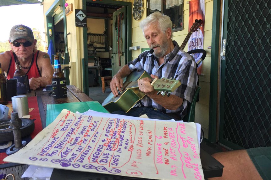 Mick practising the guitar and band setlist at the Warrell Creek Tavern.