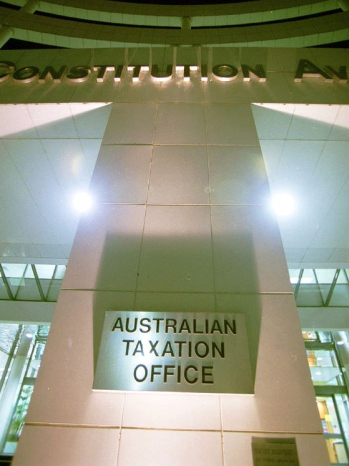 The Australian Taxation Office building exterior at night
