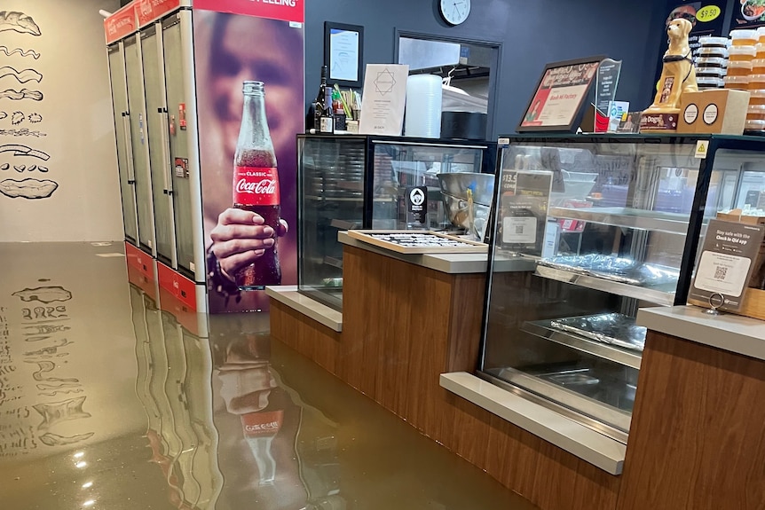 Floodwaters in Francis Chung's Vietnamese food outlet.