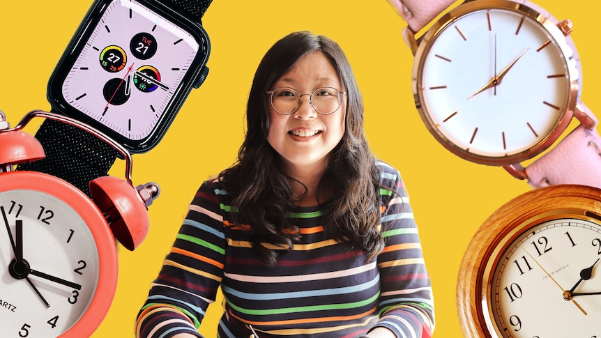 Jennifer Wong surrounded by four large watches and clocks on a yellow background.