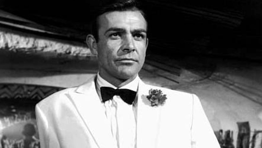A black and white image of Sean Connery in a dinner suit