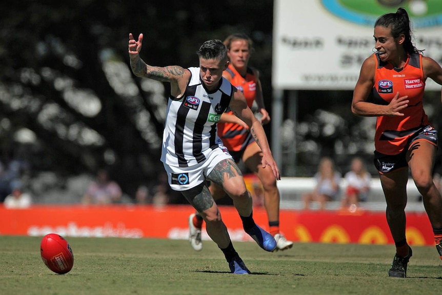 Cecilia McIntosh runs at the football during an AFLW match between Collingwood and GWS.