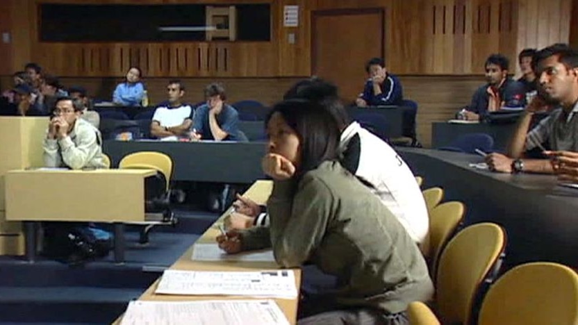 Students sit in a classroom.