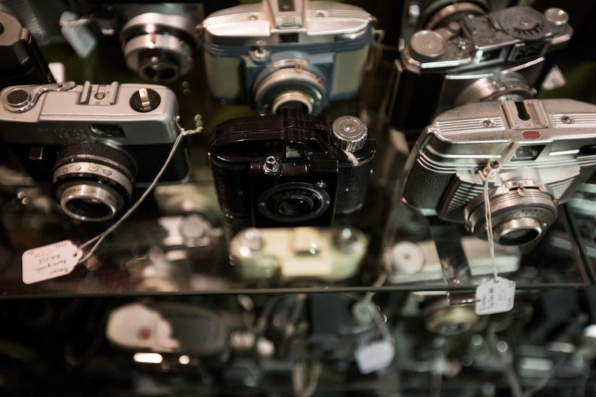 A camera collection including cameras from Leica, Pentax, Kodak, Nikon, Canon, Olympus are for sale