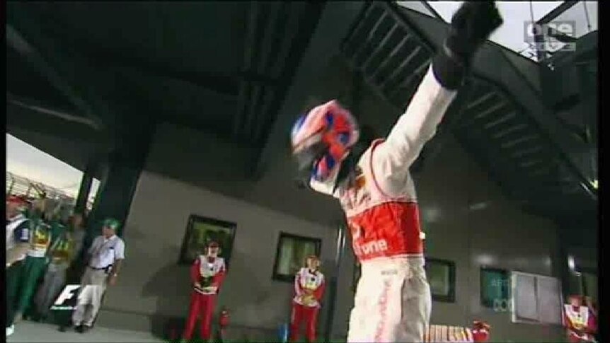 Button victorious as Webber slips up