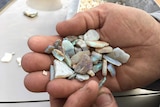 Mintabie opal in hand