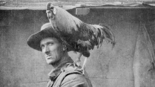 WWI soldier with a rooster on his shoulder