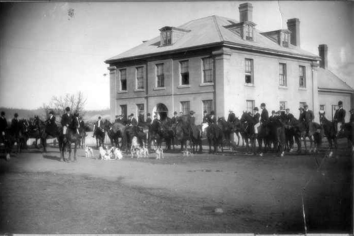Ready for the hunt, riders and hounds assemble outside the Melton Mowbray hotel (undated)