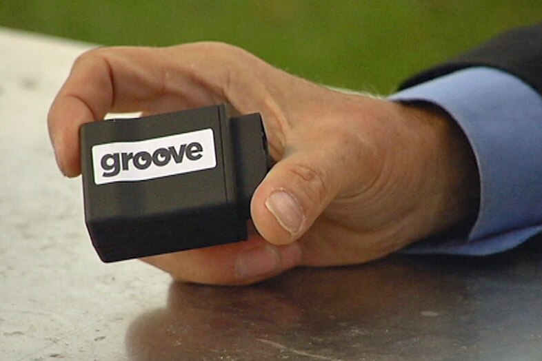 The device that plugs into cars to block text messages.