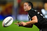 Raecene McGregor catches the ball during a New Zealand Kiwi Ferns Rugby League World Cup game.