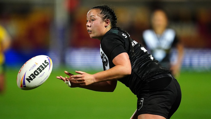 Raecene McGregor catches the ball during a New Zealand Kiwi Ferns Rugby League World Cup game.
