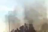 YouTube still of smoke rising in the Libyan city of Al Bayda