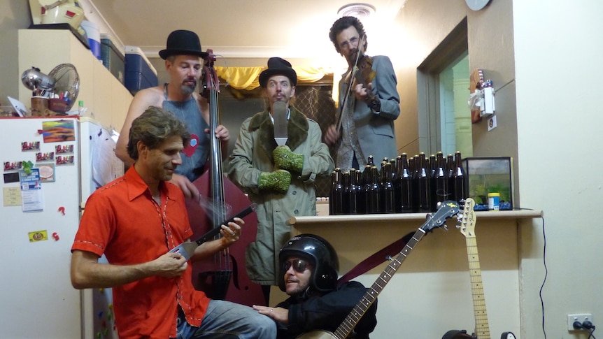 The Anula Dads Band rehearsing in the kitchen