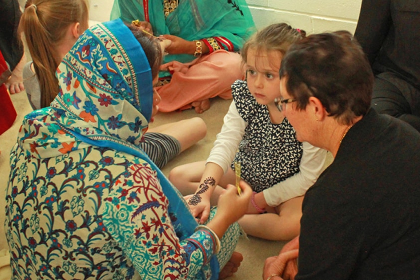 Children taking part in henna