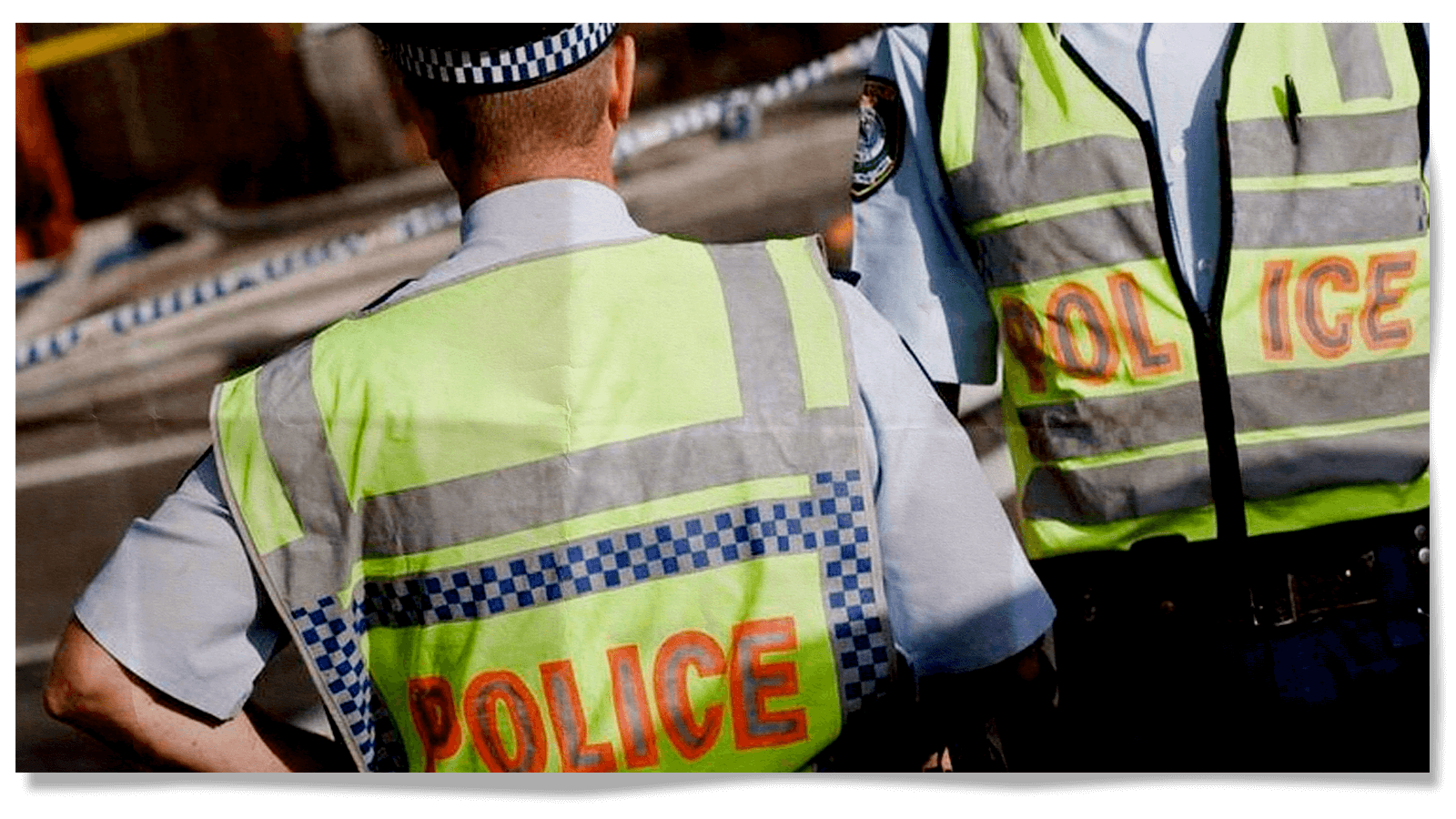 Two police officers wearing high-vis vests
