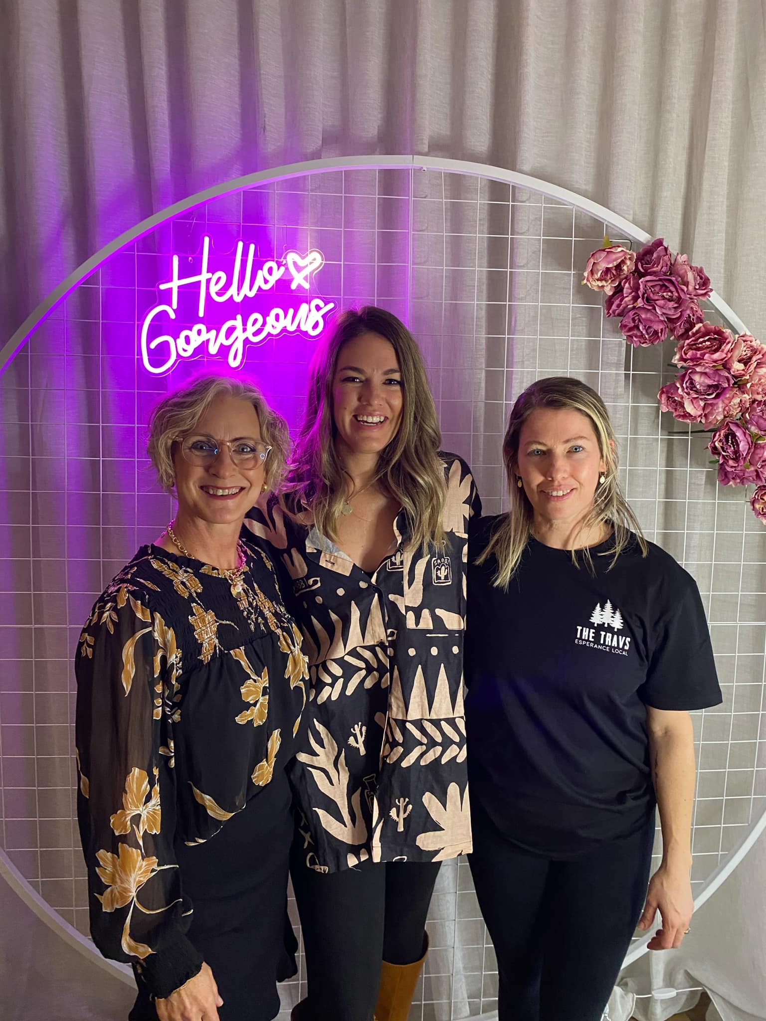 Three women at a social function. 