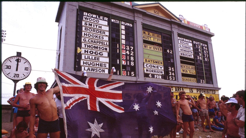 The SCG scoreboard and the crowd on the Hill in the 1980s.